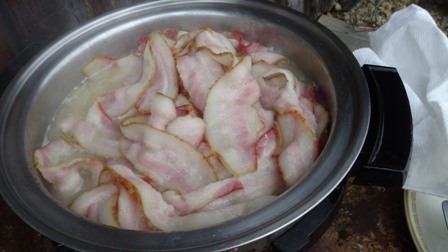 bacon fried in water